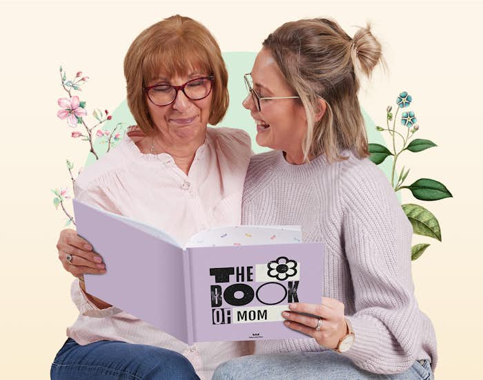 A mom reading her book with her daughter