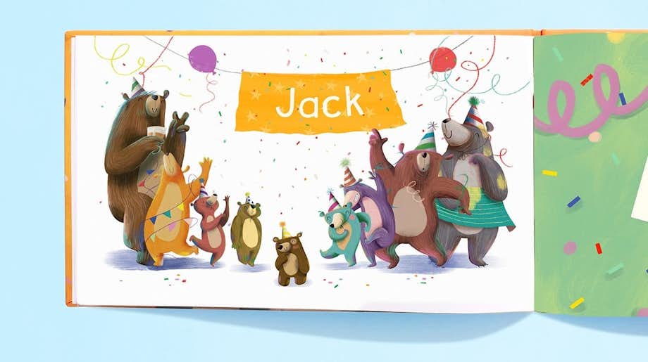 Zoomed in image of littlest bear crowded around his family members with his name printing on a banner