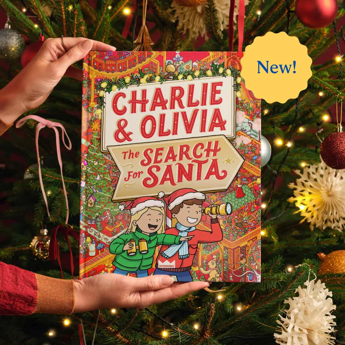 holding book in front of tree