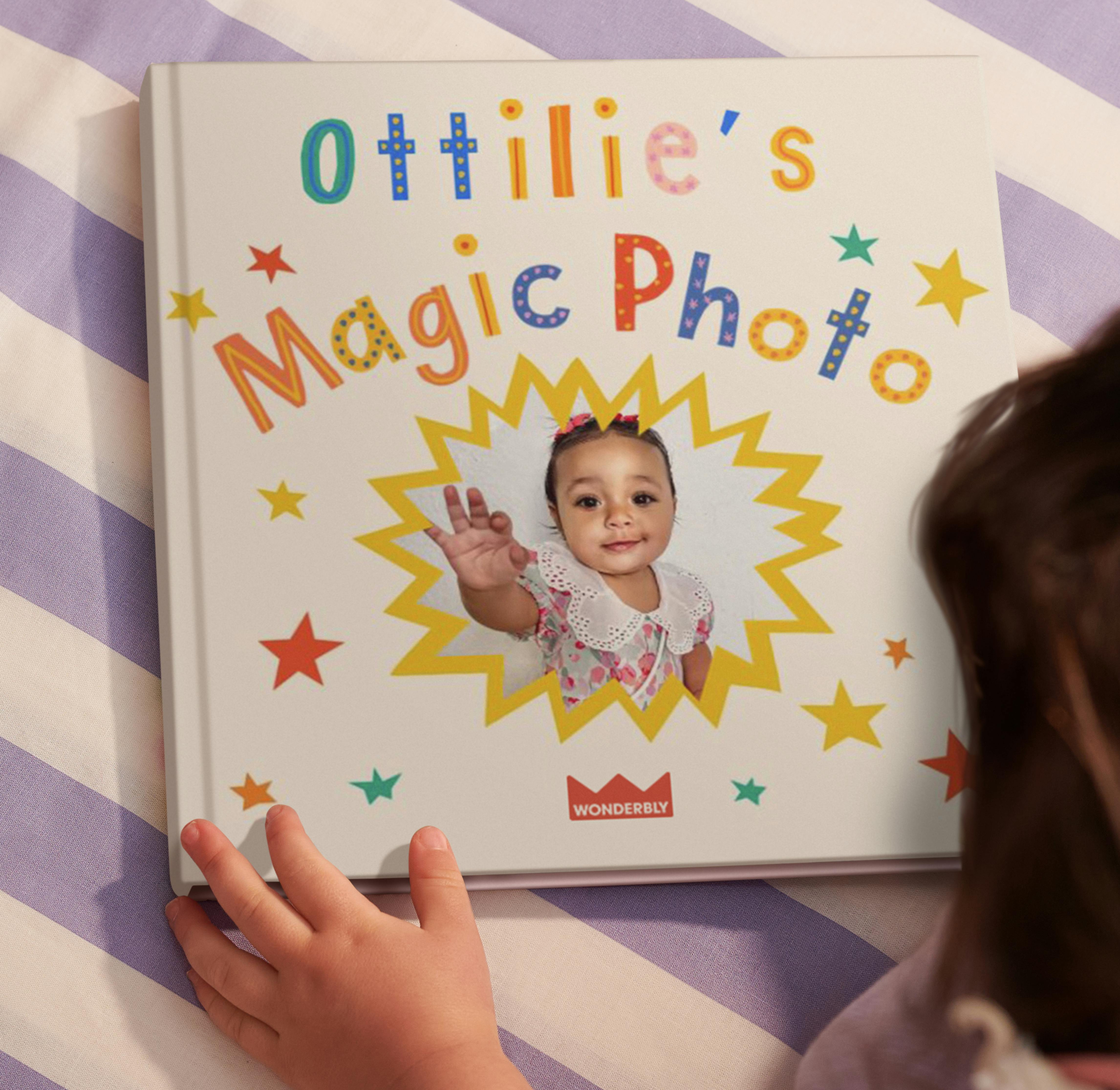 child reading magic photo book