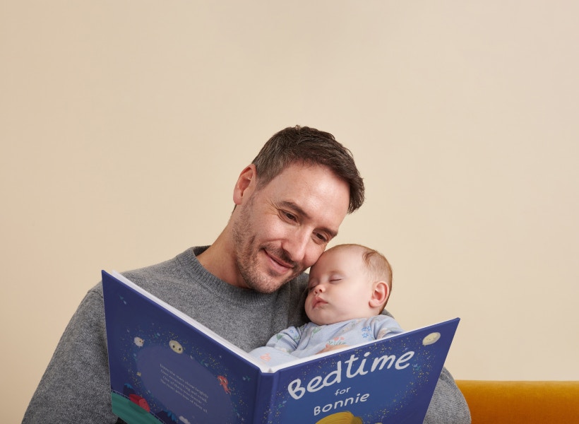 dad and baby reading bedtime for you