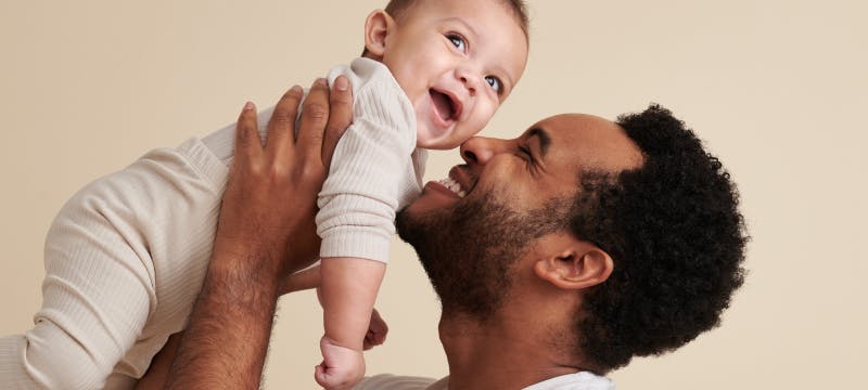 story books name dad and kid hugging