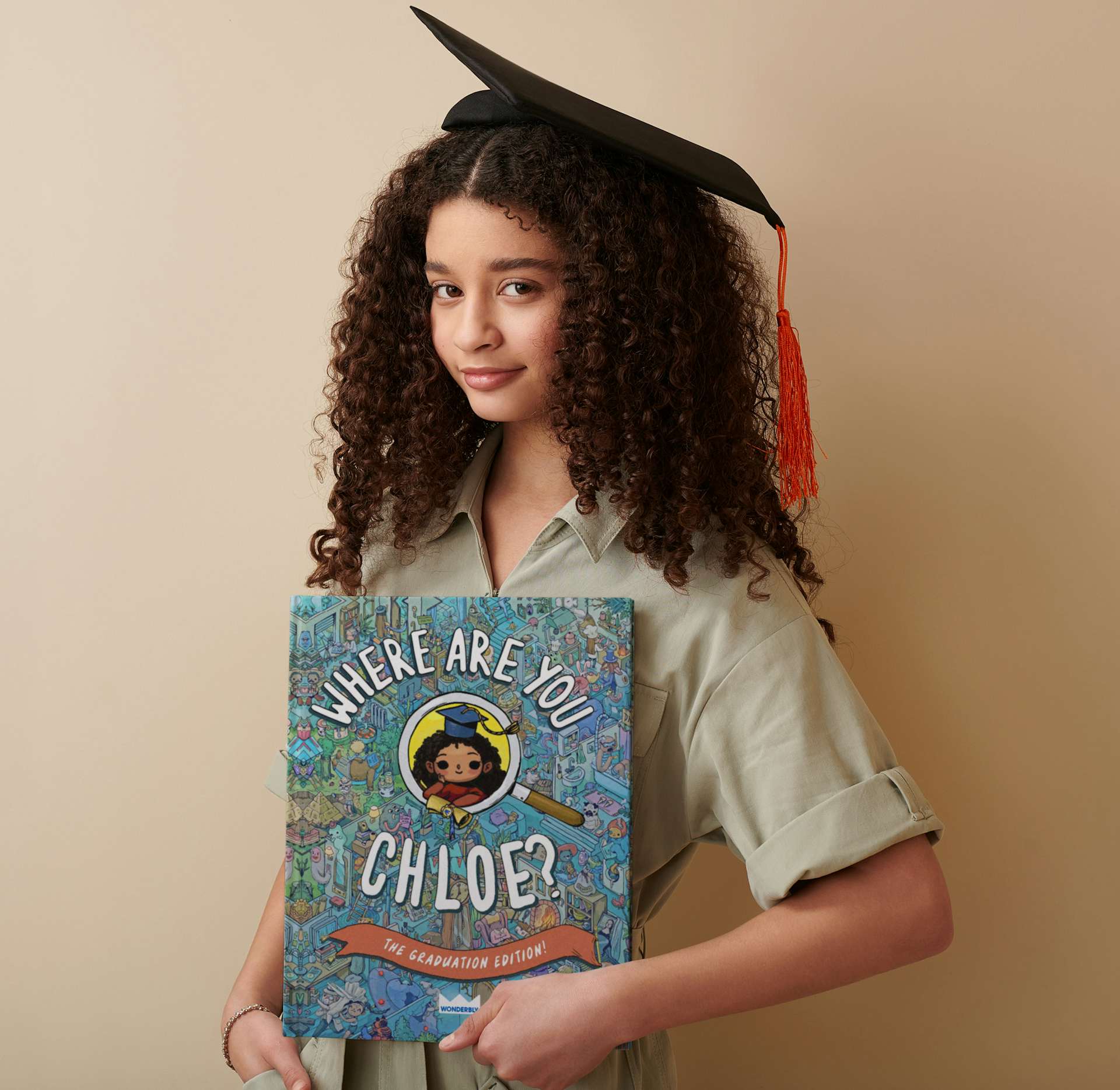 Child holding a personalised book