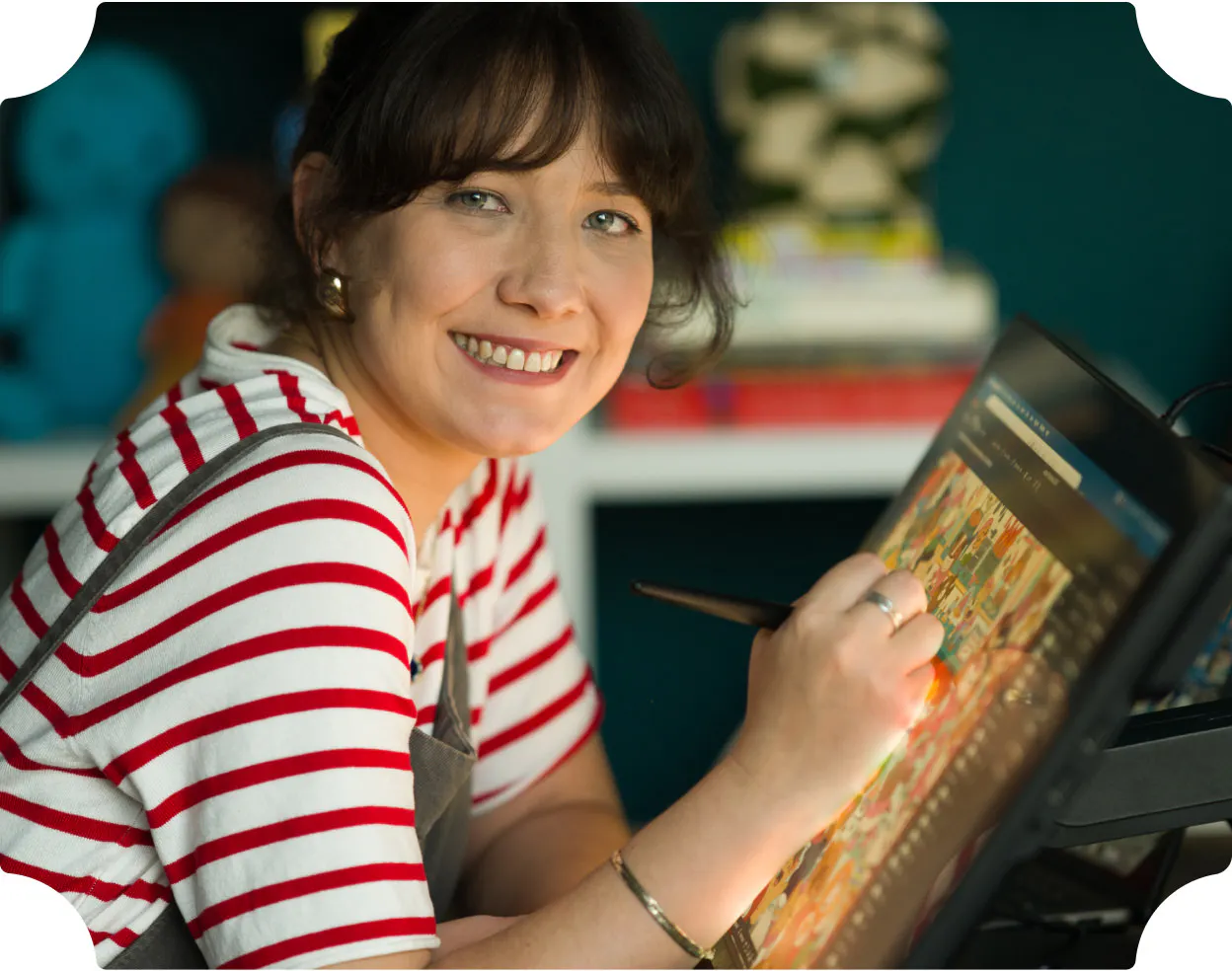 Illustrator posing with computer