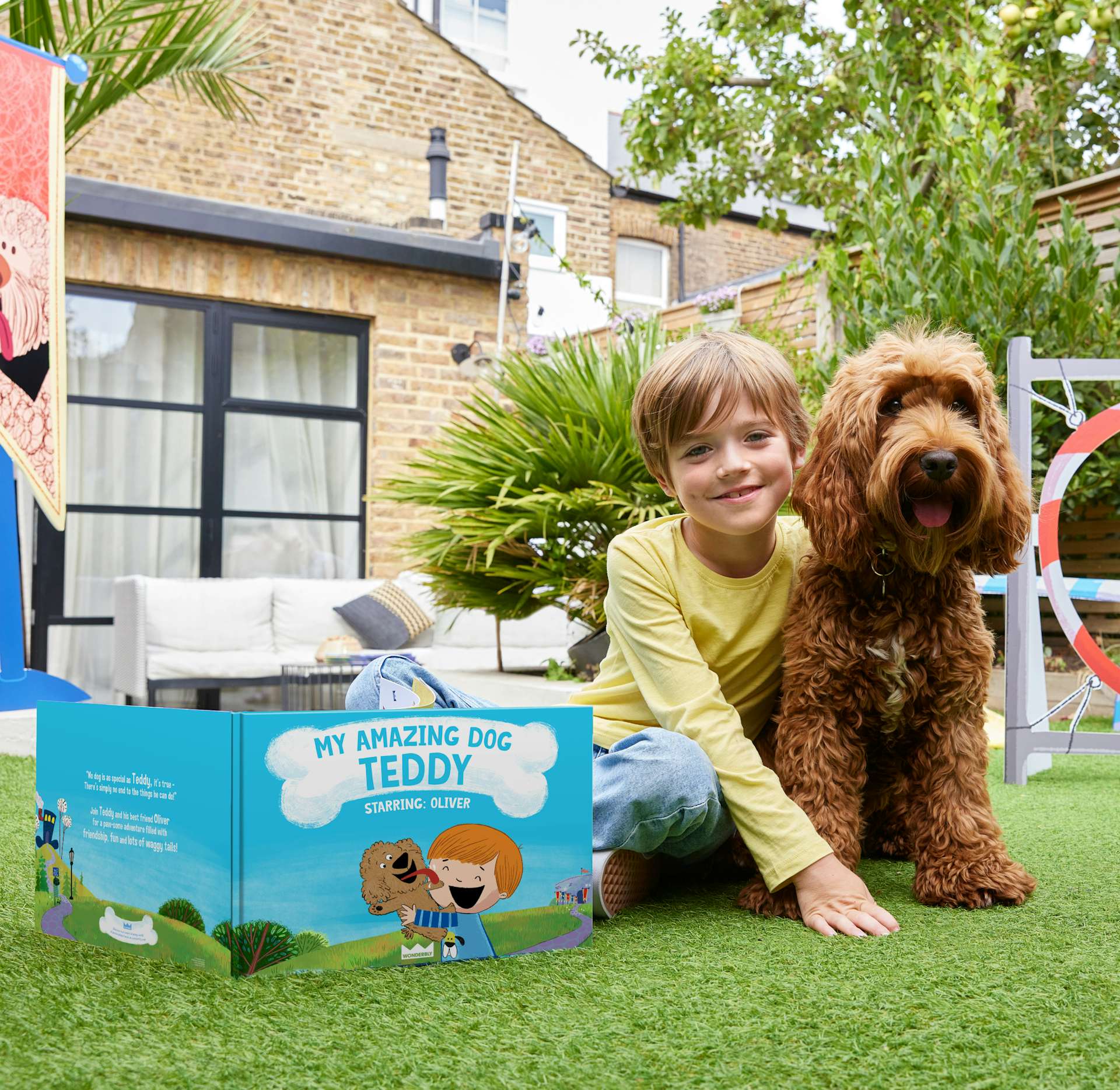 A child and his dog with their personalised book