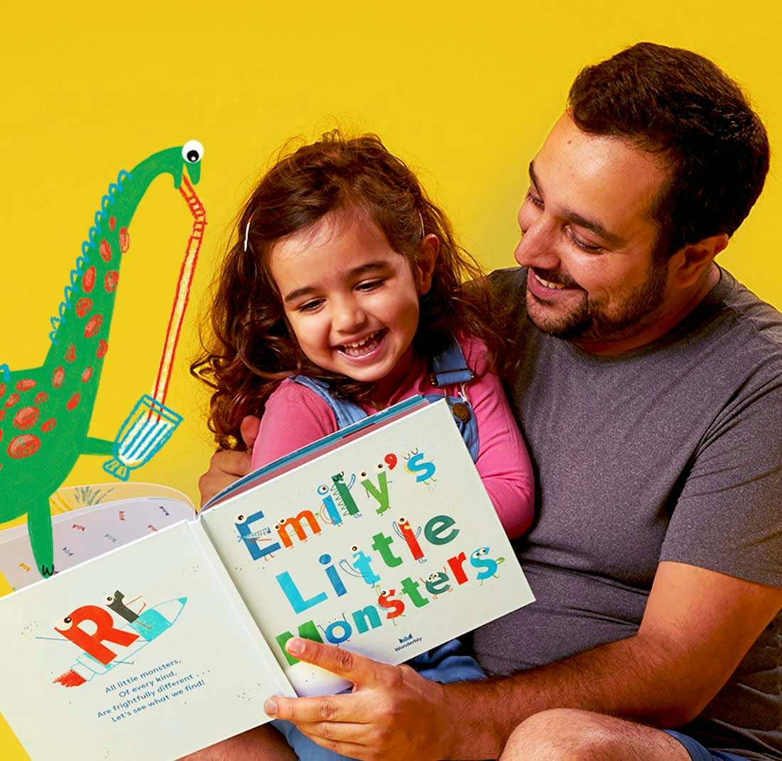 Father and daughter reading the book together