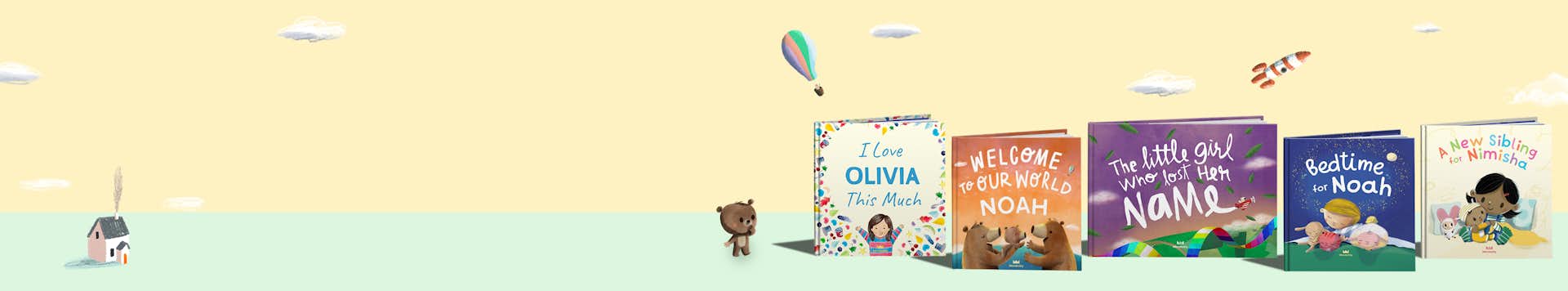 Collection of Wonderbly books for babies