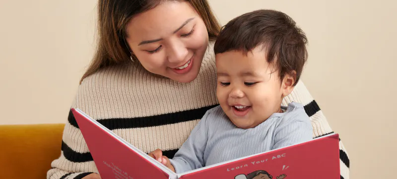 mum and kid reading ABC for You