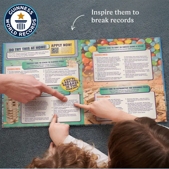 Two children reading the personalised book