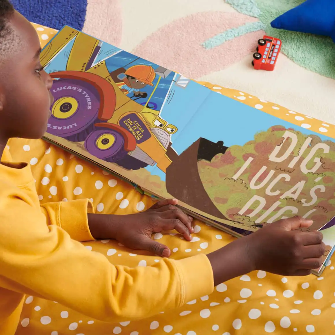 child reading dig dig book