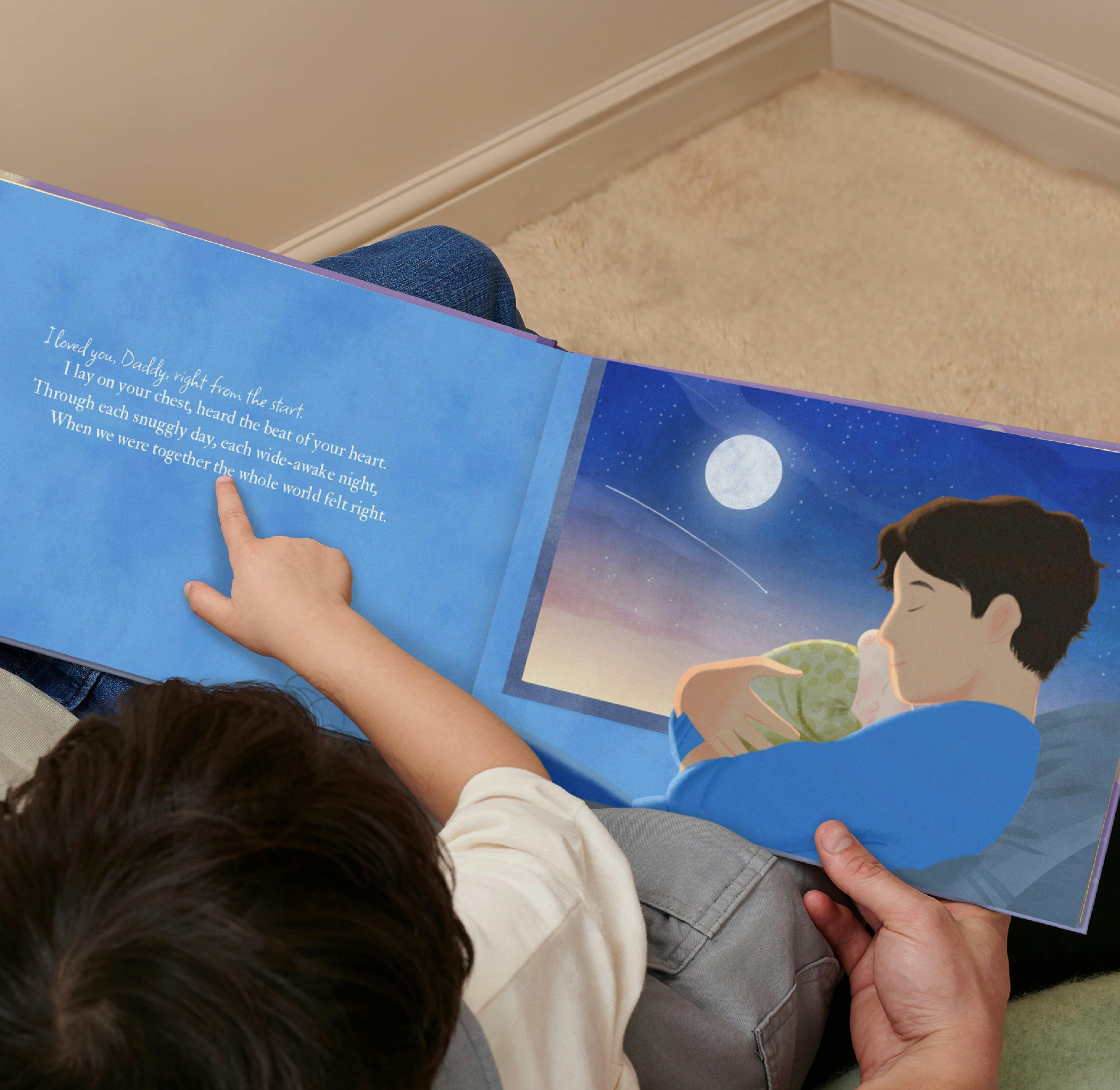 A child and father reading the personalised book