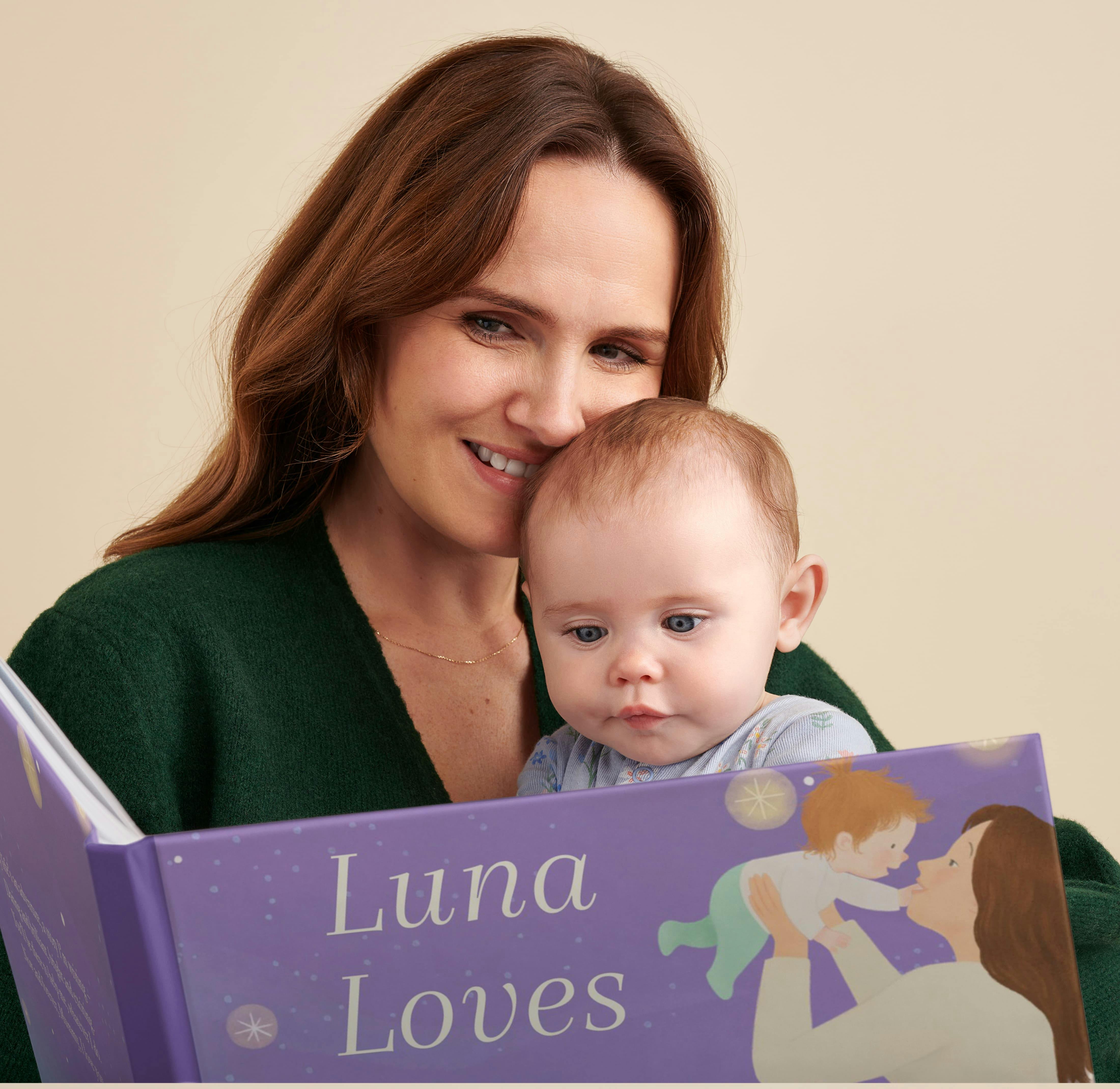 A child and mother looking at the book