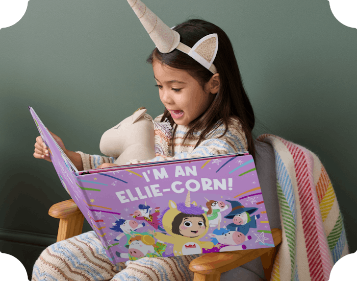 child reading personalised book
