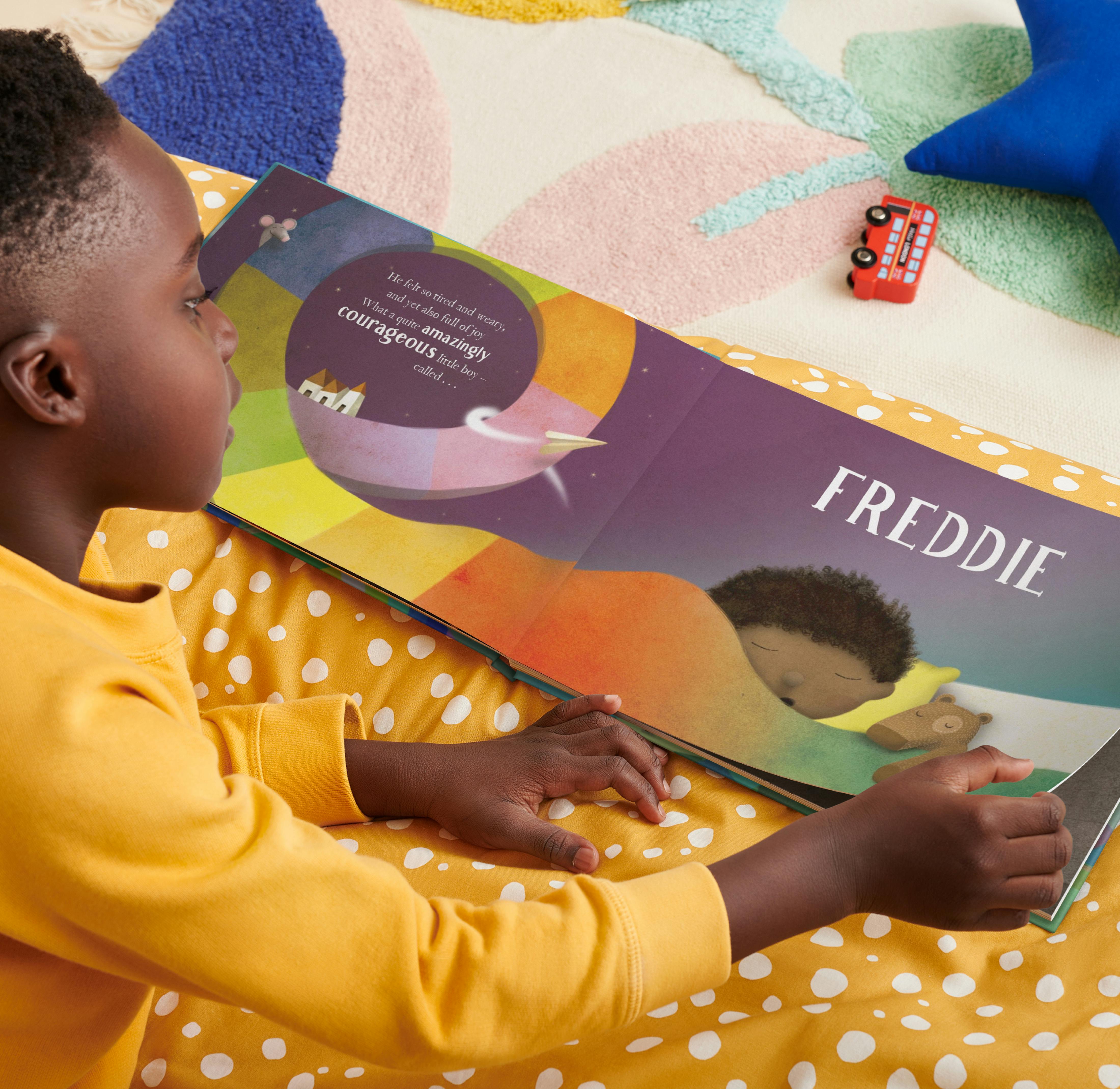 child reading personalised book