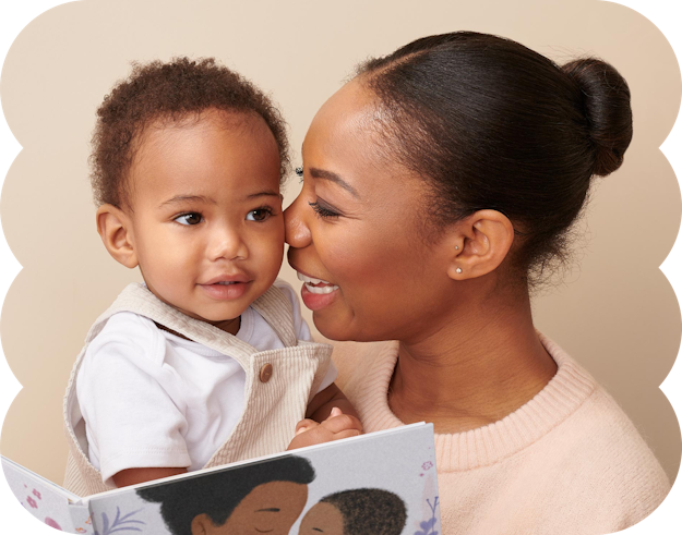 mother and child hugging reading personalised book