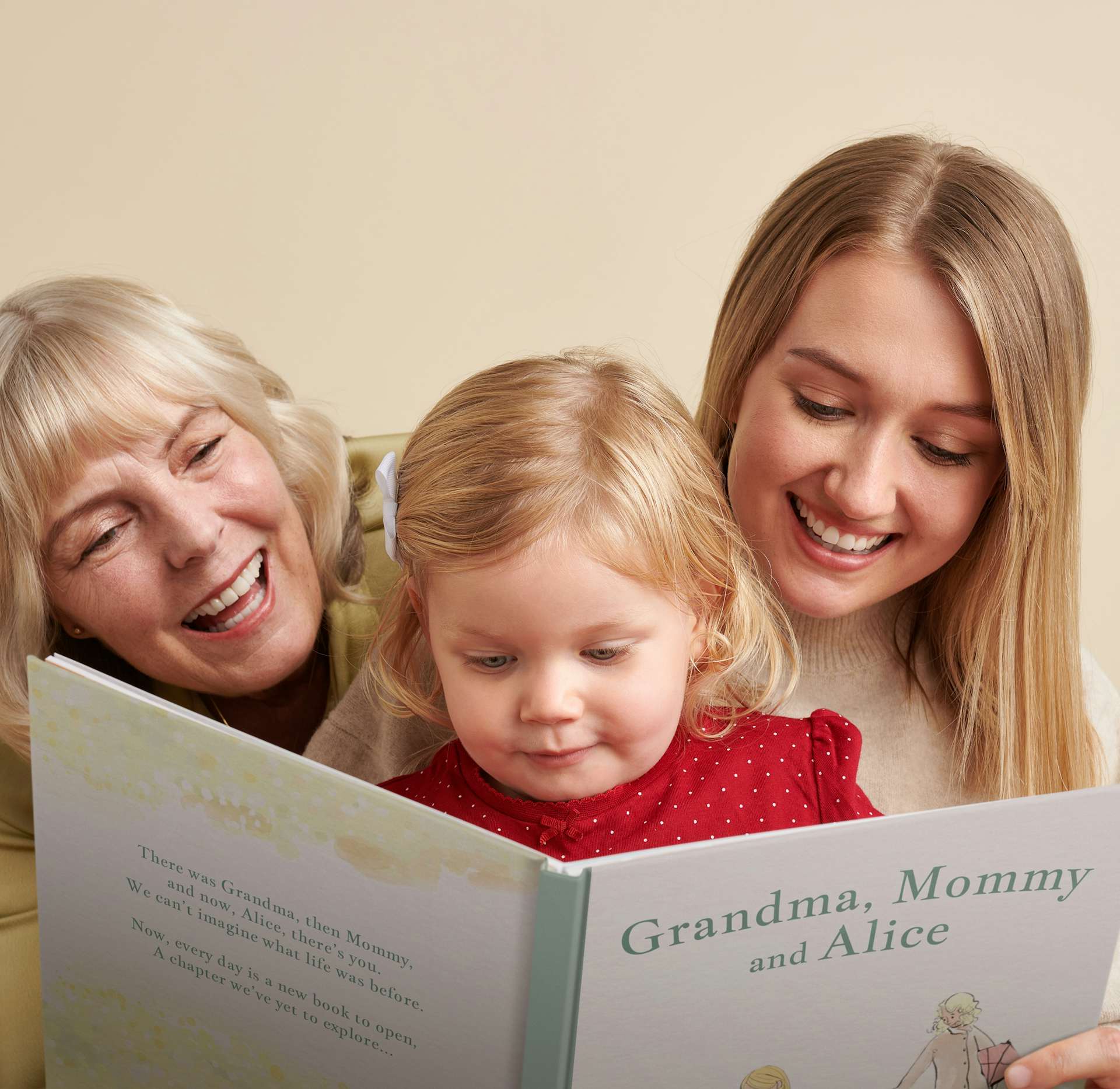grandma, mother and child reading personalised book