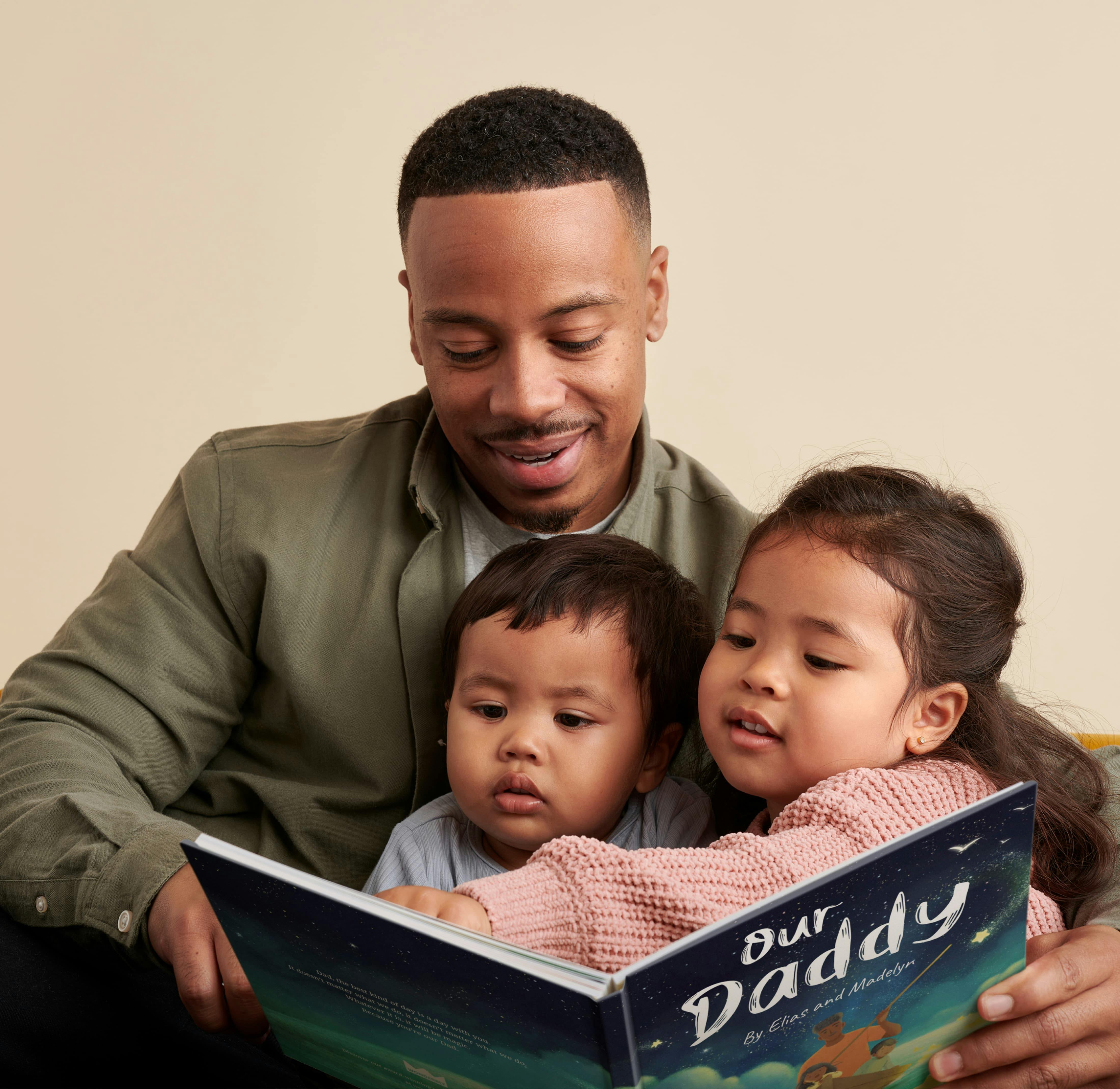 A child and father reading the personalised book