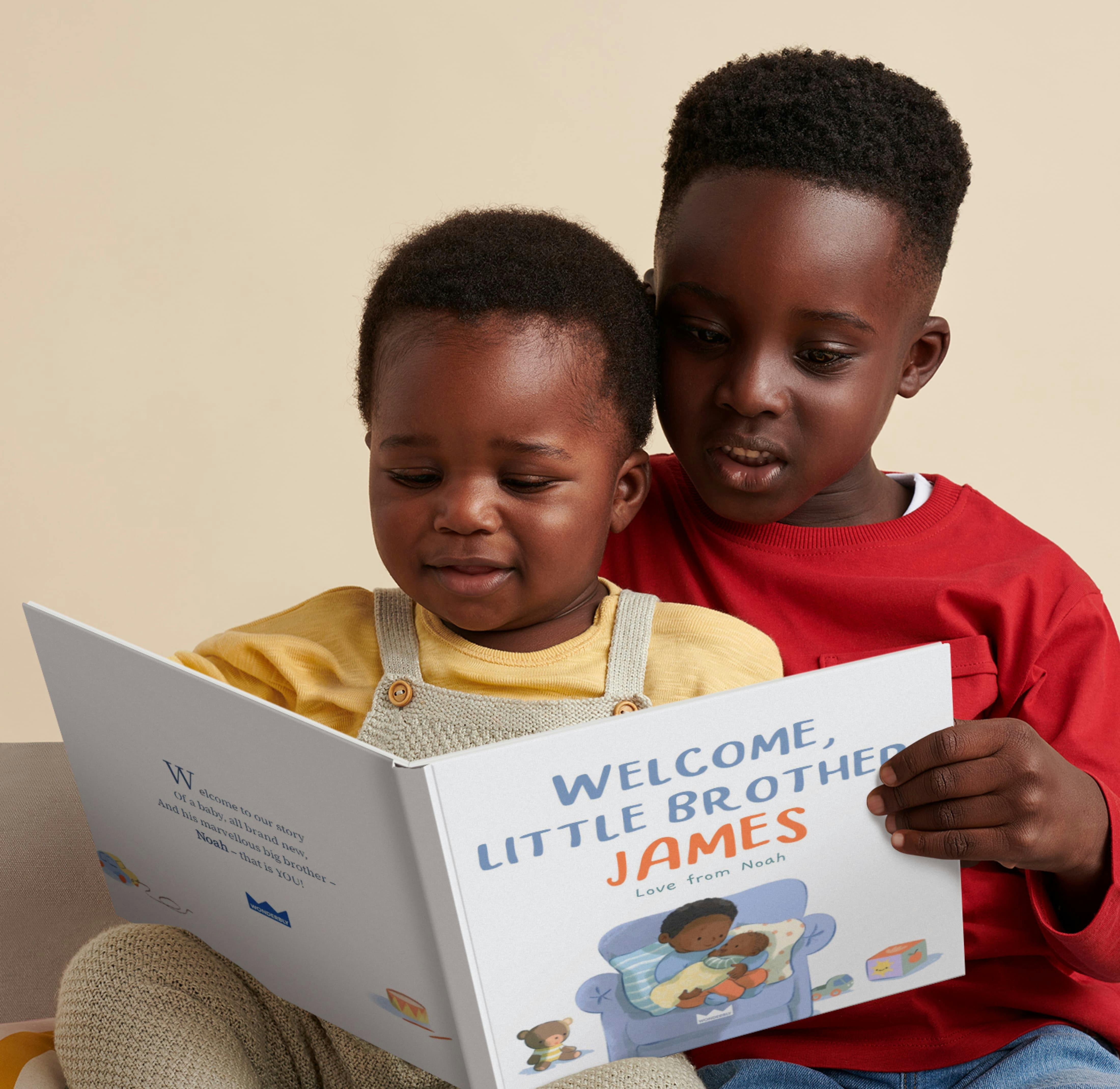 Two children reading the personalised book