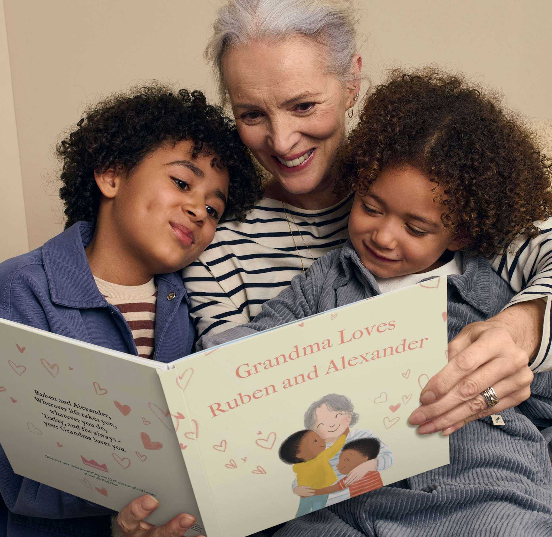 grandma and children reading personalised book