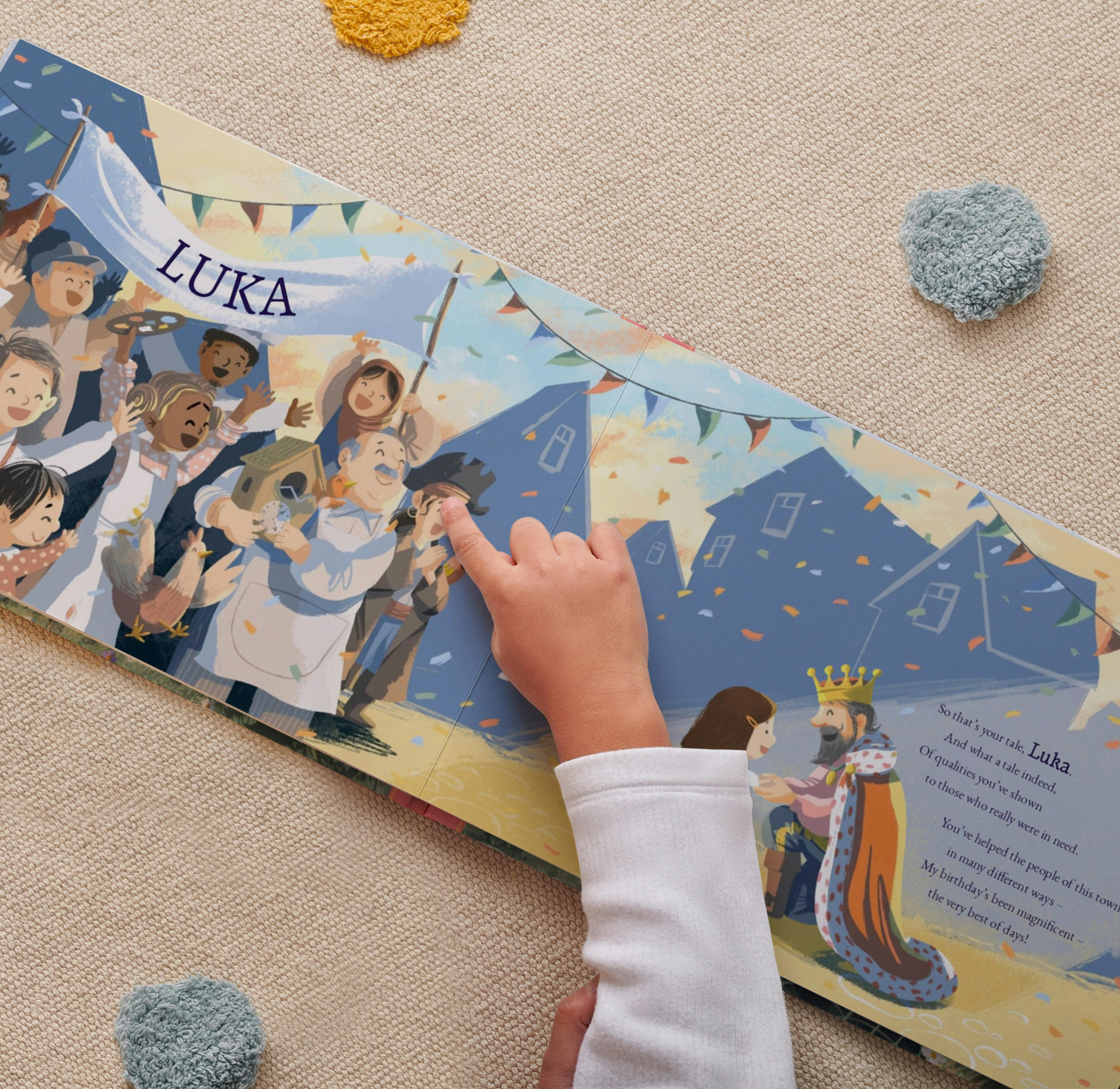 Child holding their personalised book