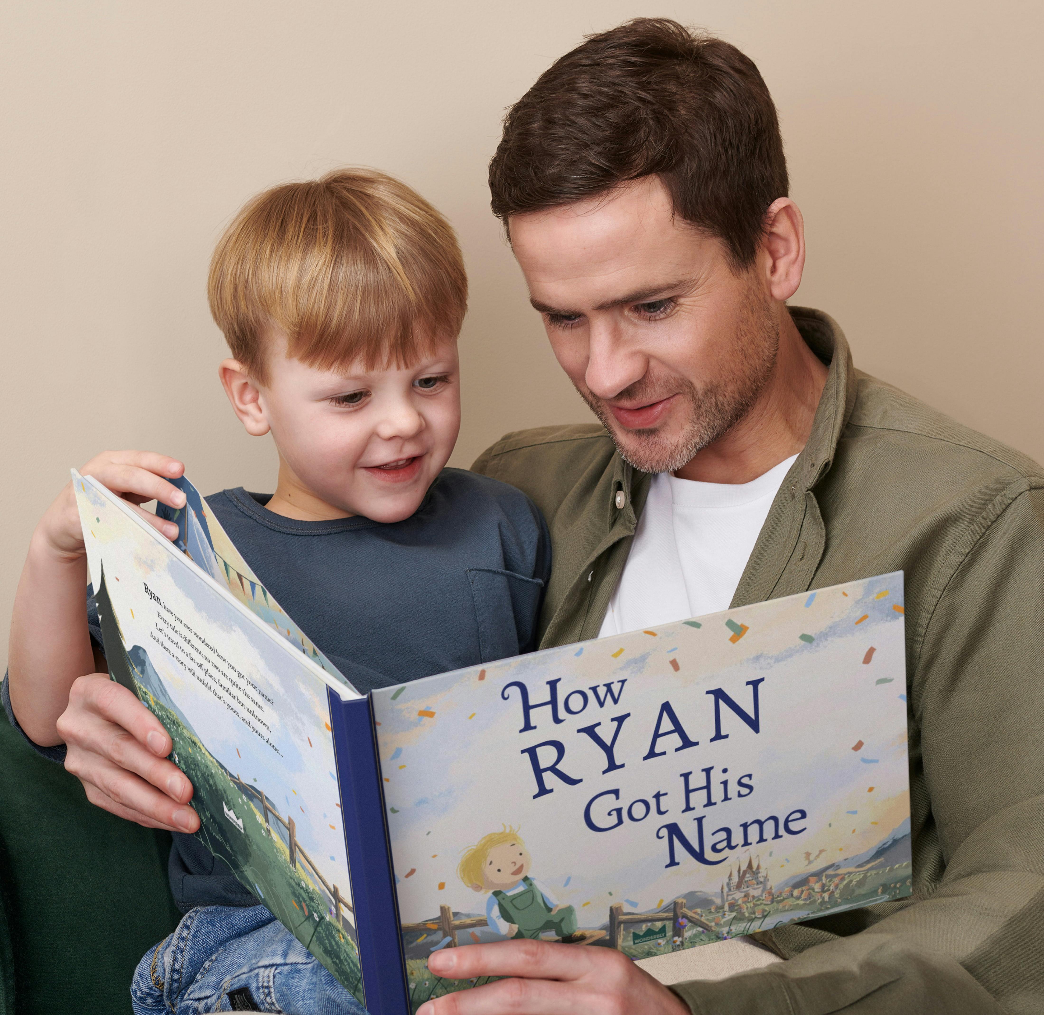 A child and father reading the personalised book