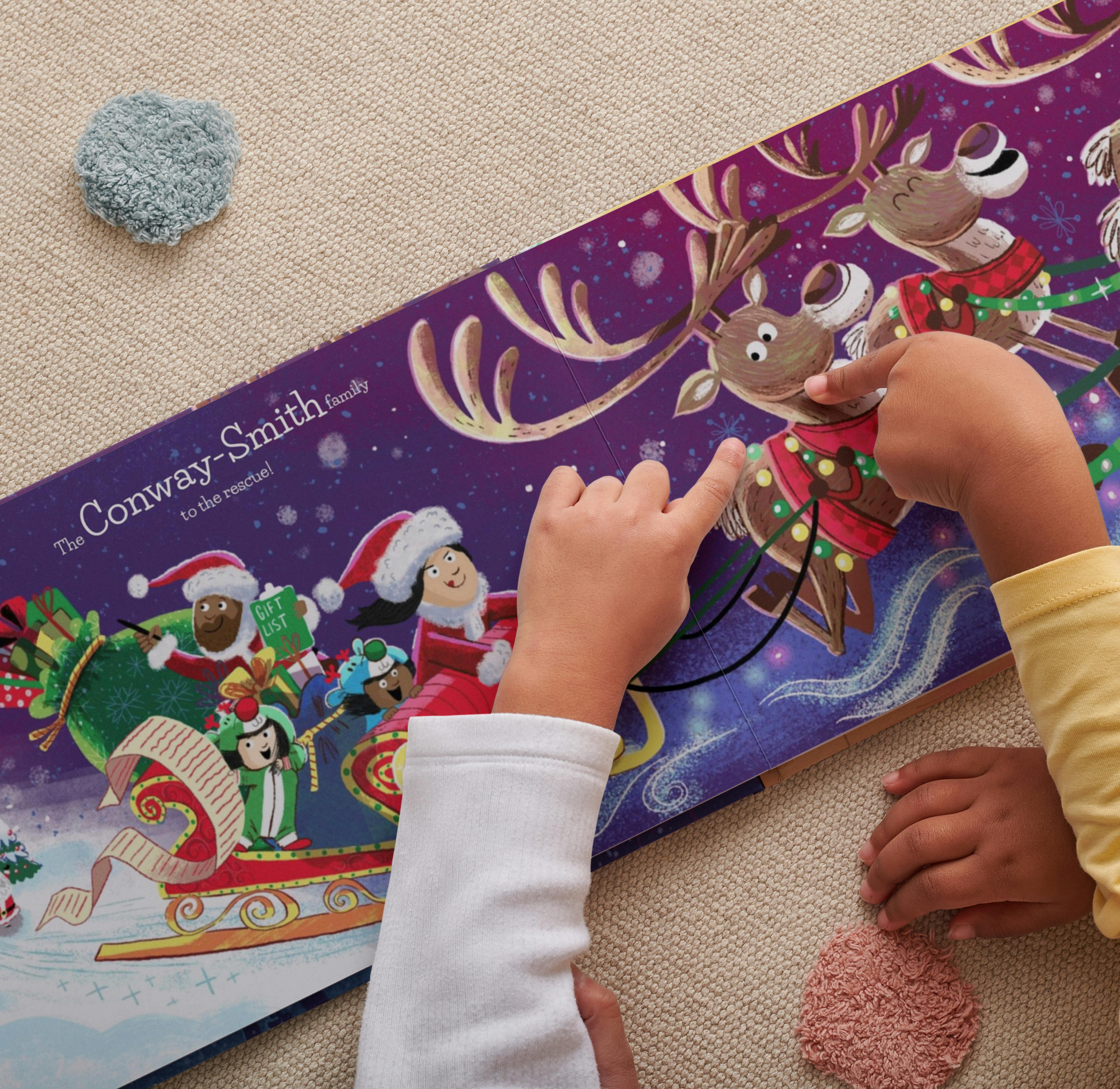 Two children reading the personalised book