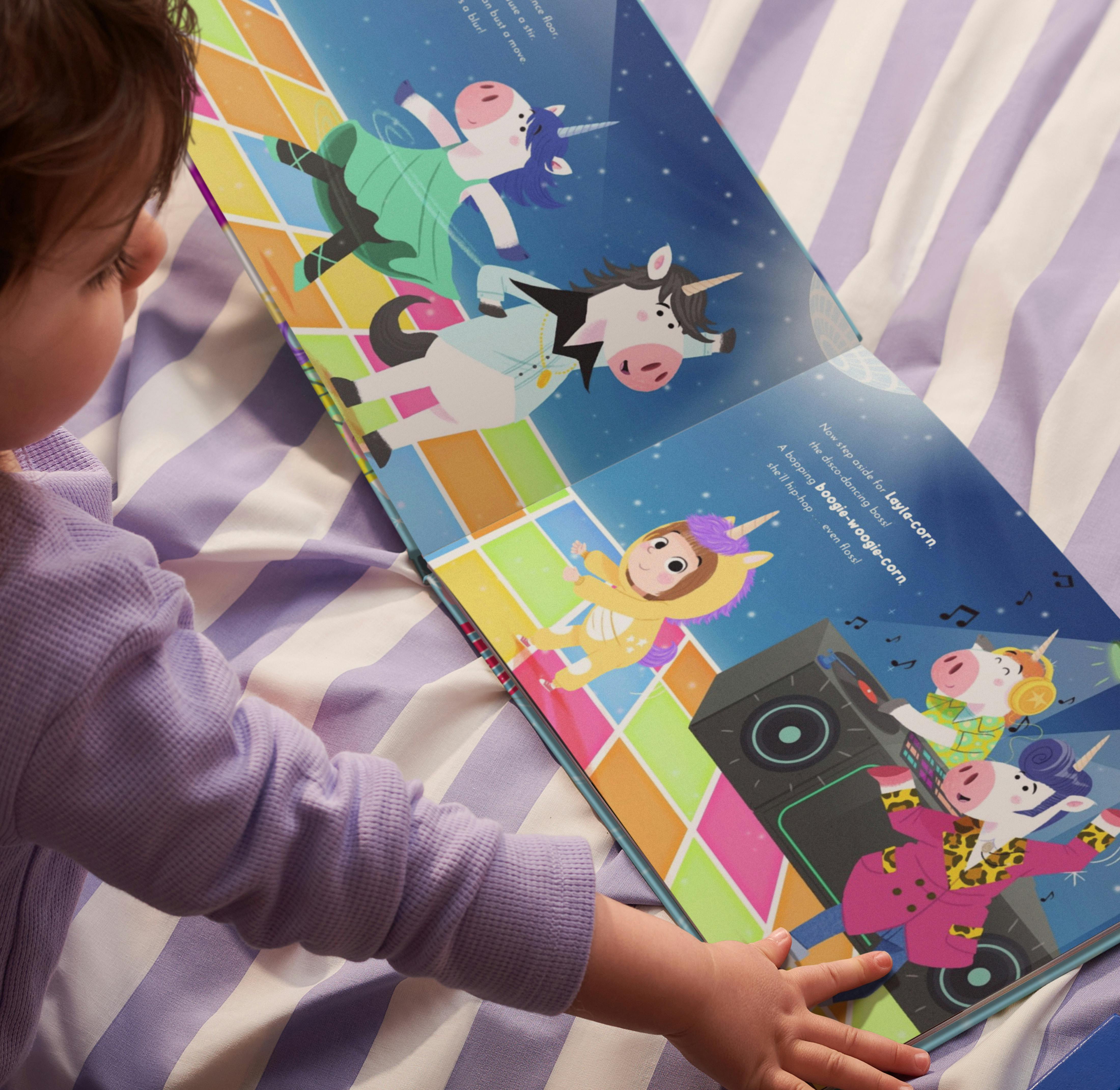 Child holding their personalised book