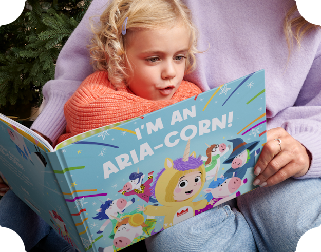 A child and mother reading the personalised book