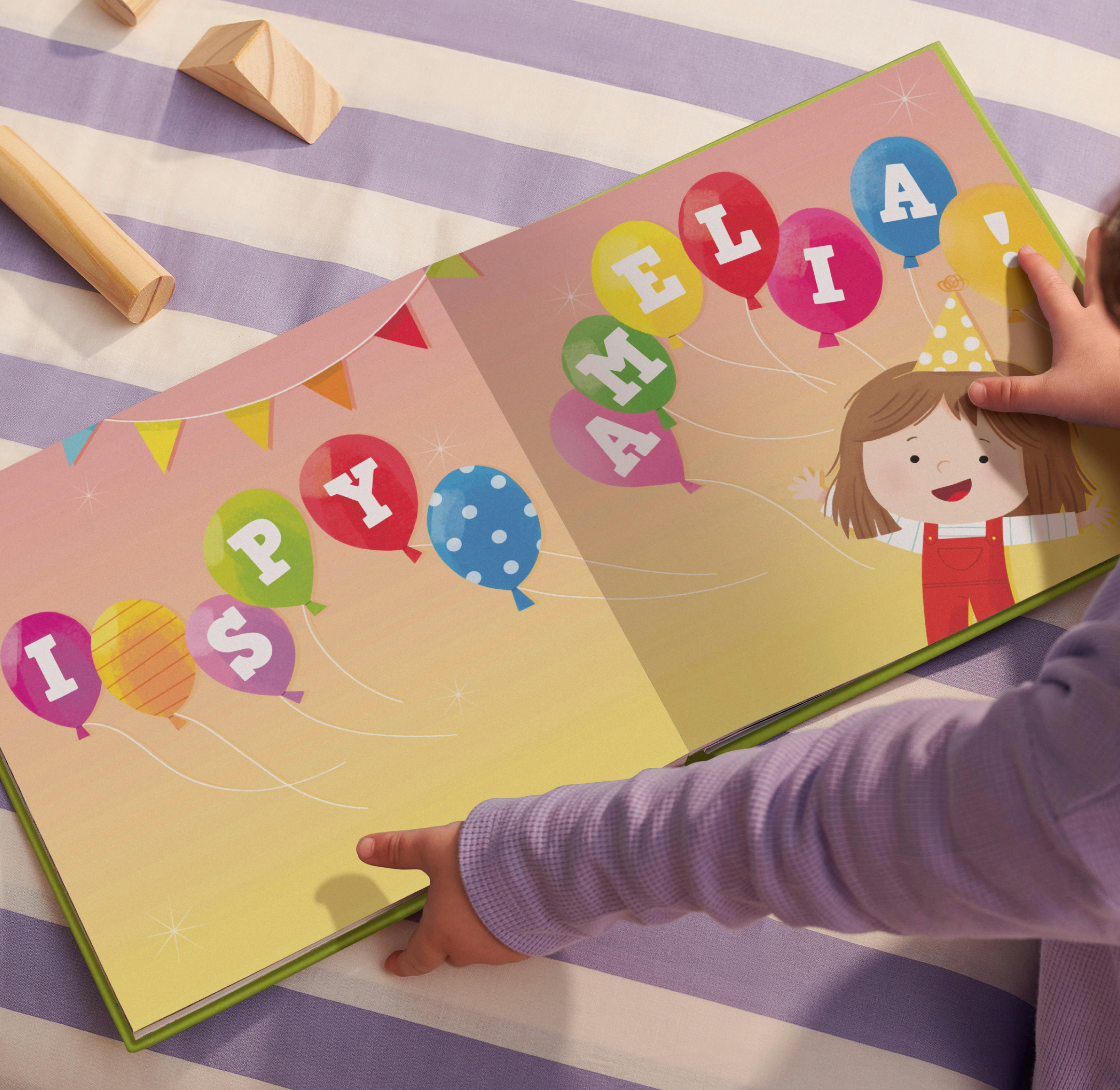 Child holding their personalised book