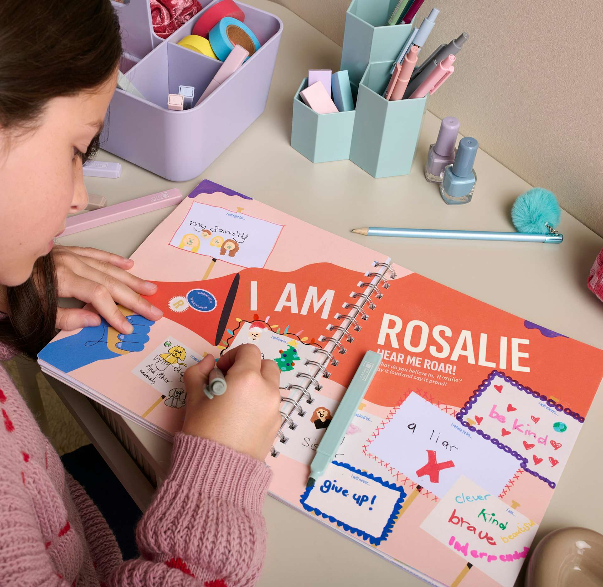 child writing in personalised journal book