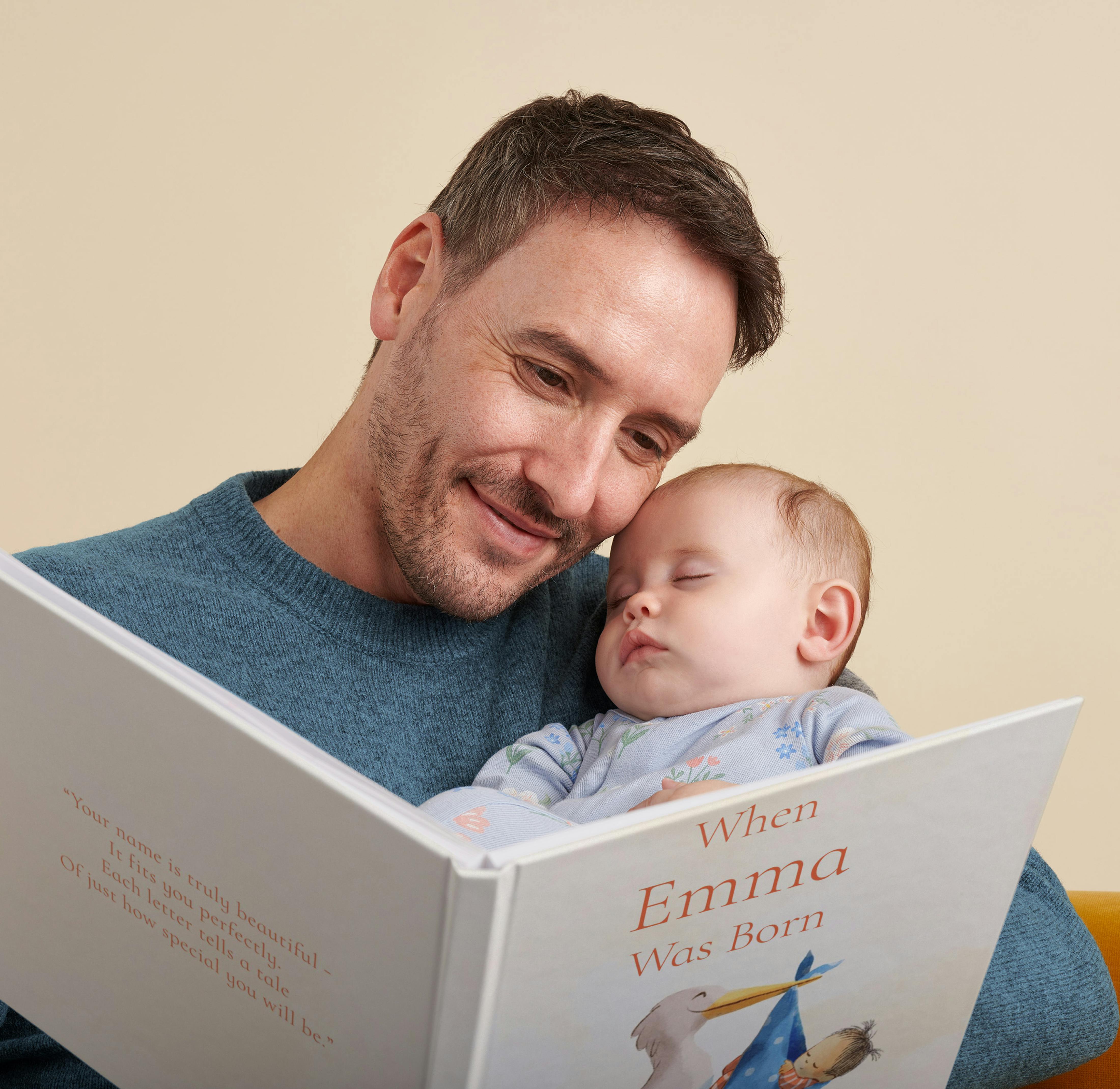 father and child reading personalised book