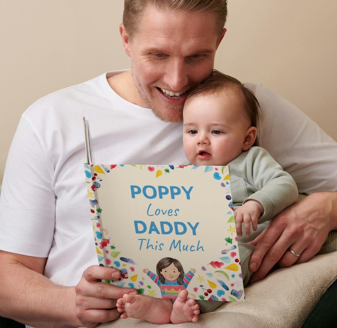 father and child reading personalised book