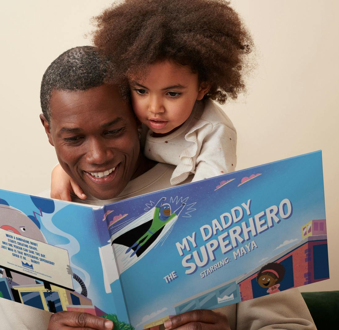 father and child reading personalised book