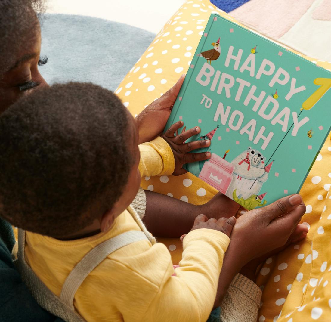 child reading personalised book