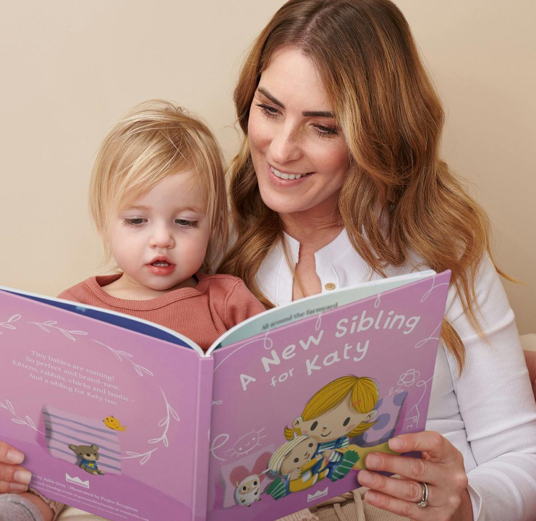 mother and child reading personalised book