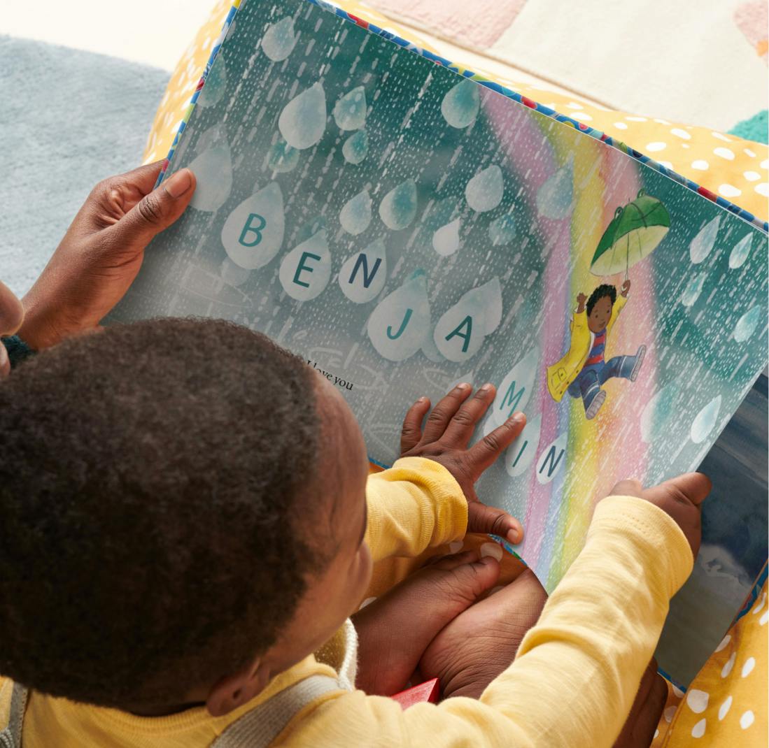 child reading personalised book