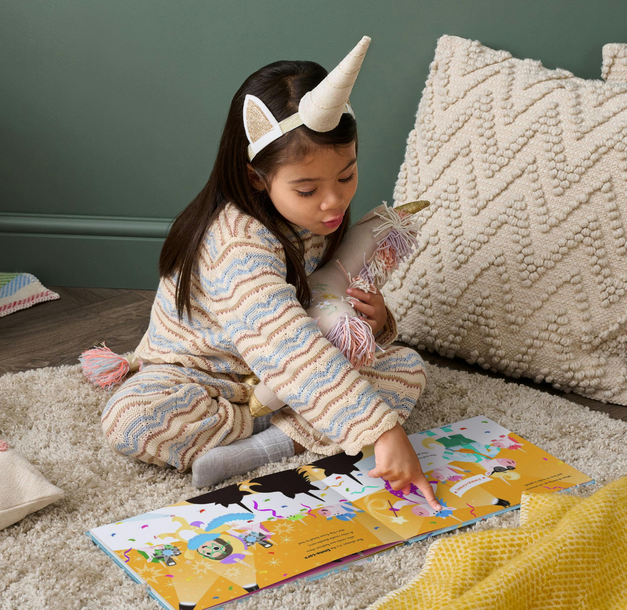 child reading personalised book