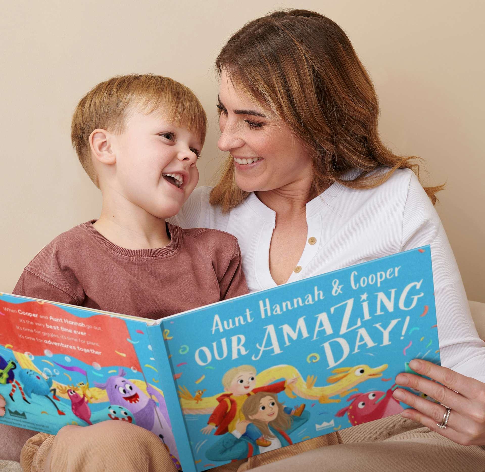 A child and auntie reading the personalised book