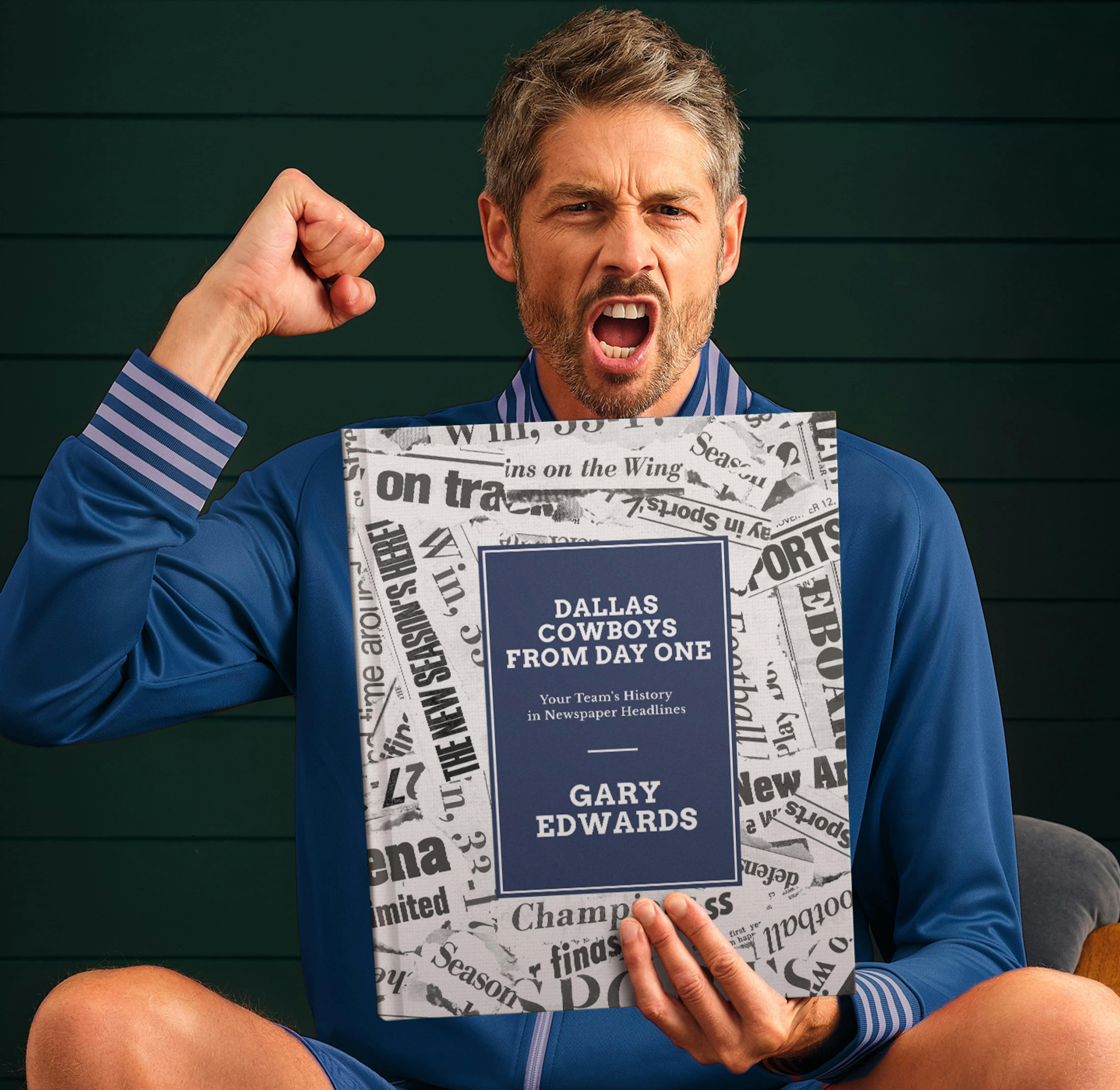 An adult football fan holding their book