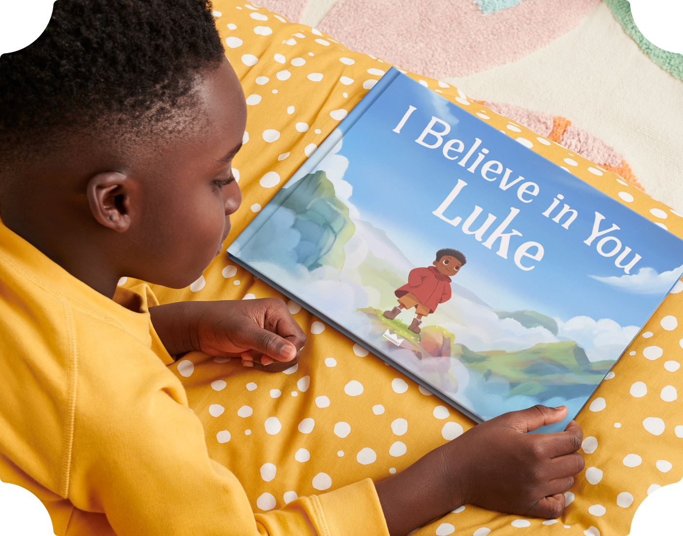 Child holding their personalised book