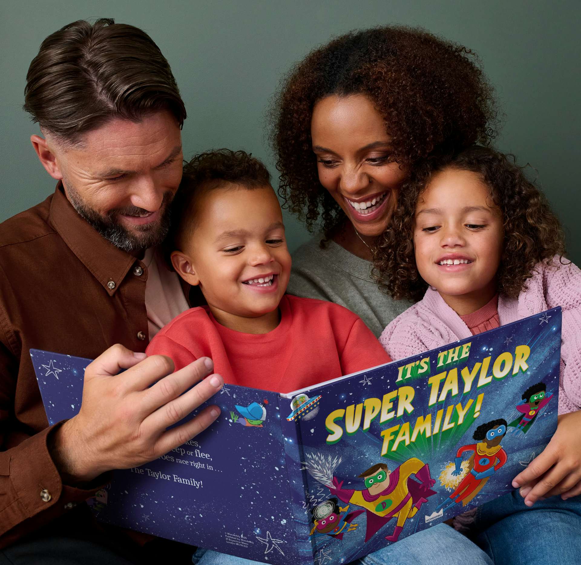 Family reading a book together