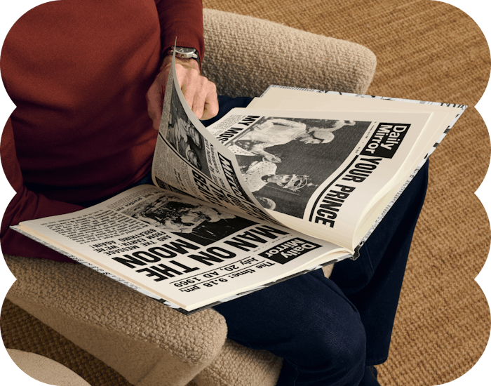 A newspaper page inside the book