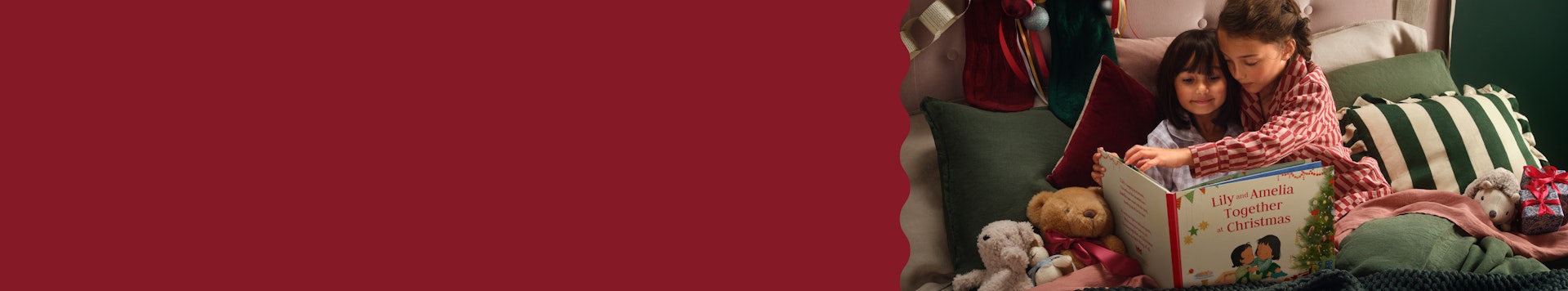 2 kids reading Together at Christmas