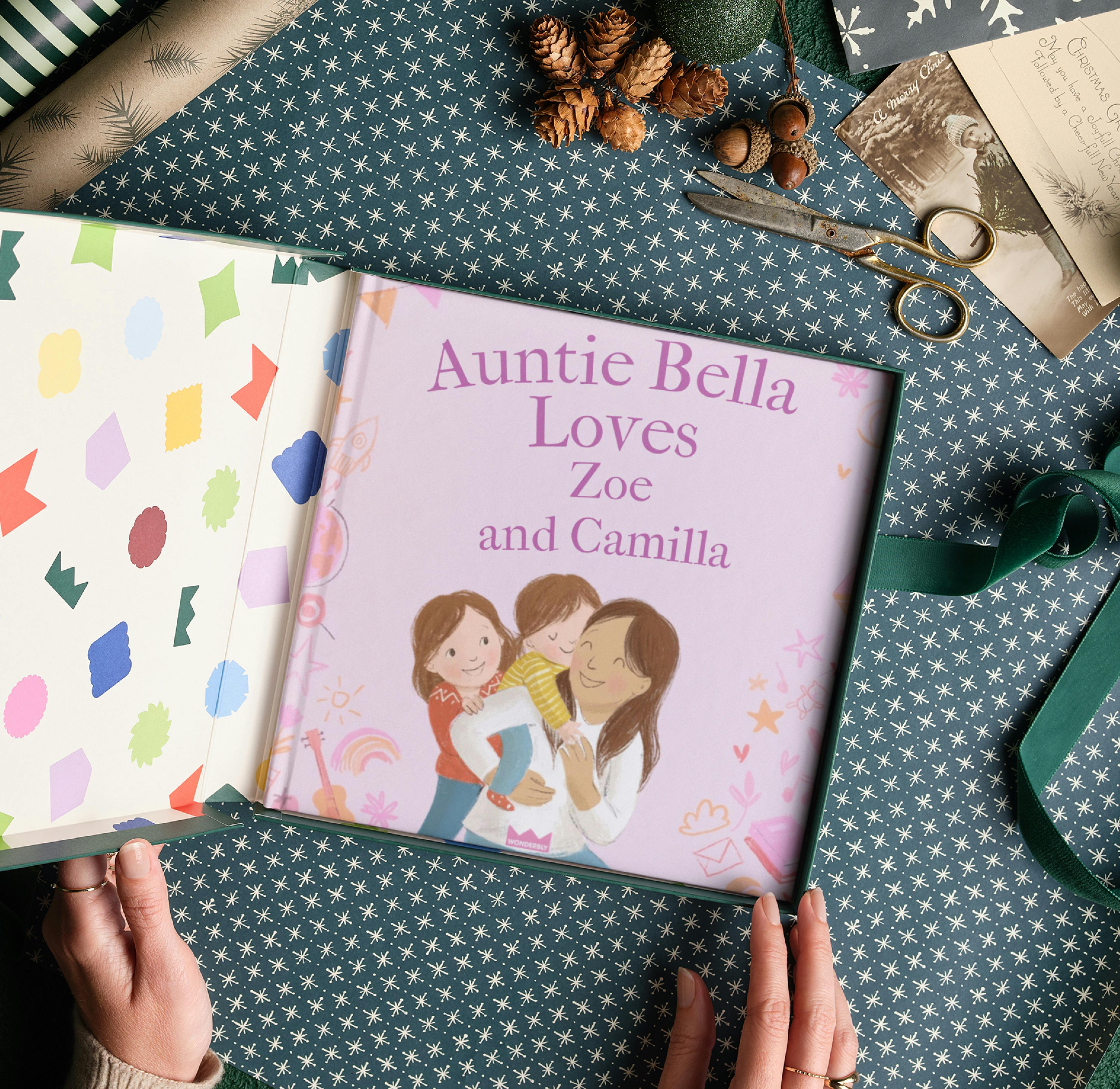 Two hands wrapping the personalised book
