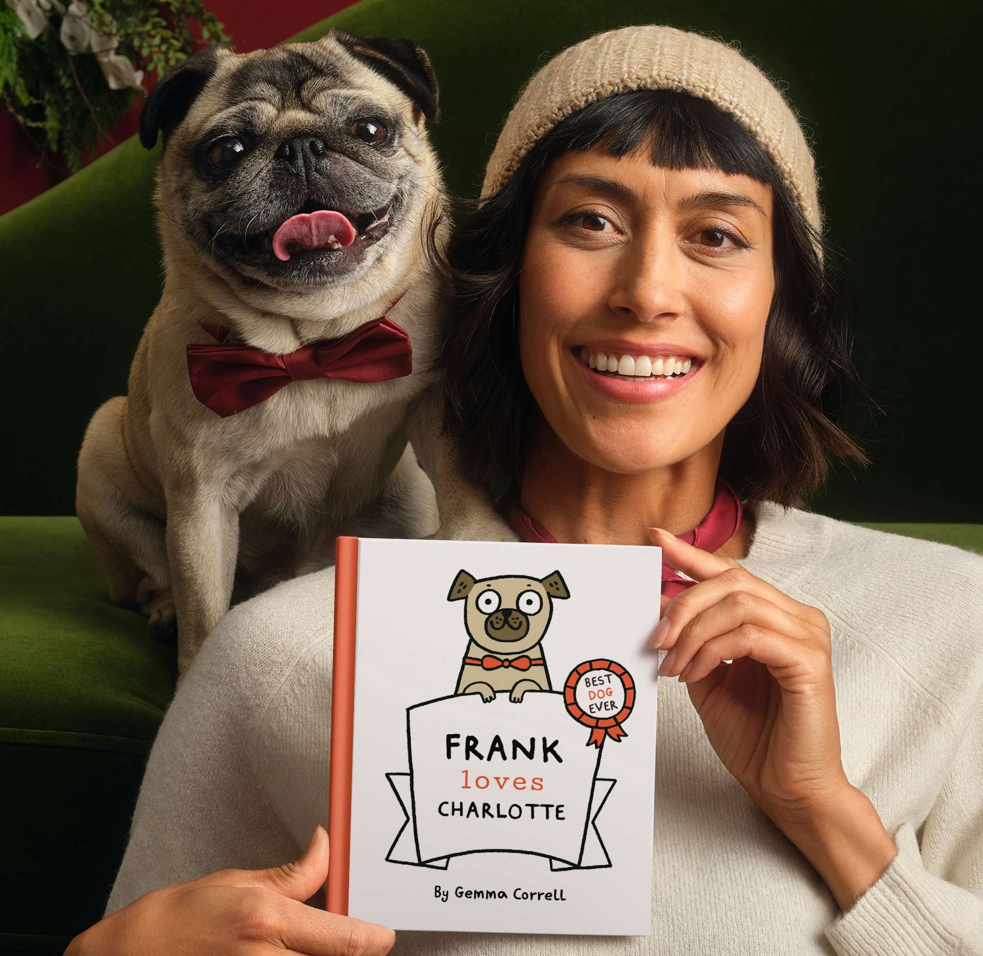 A dog and their human with personalised book