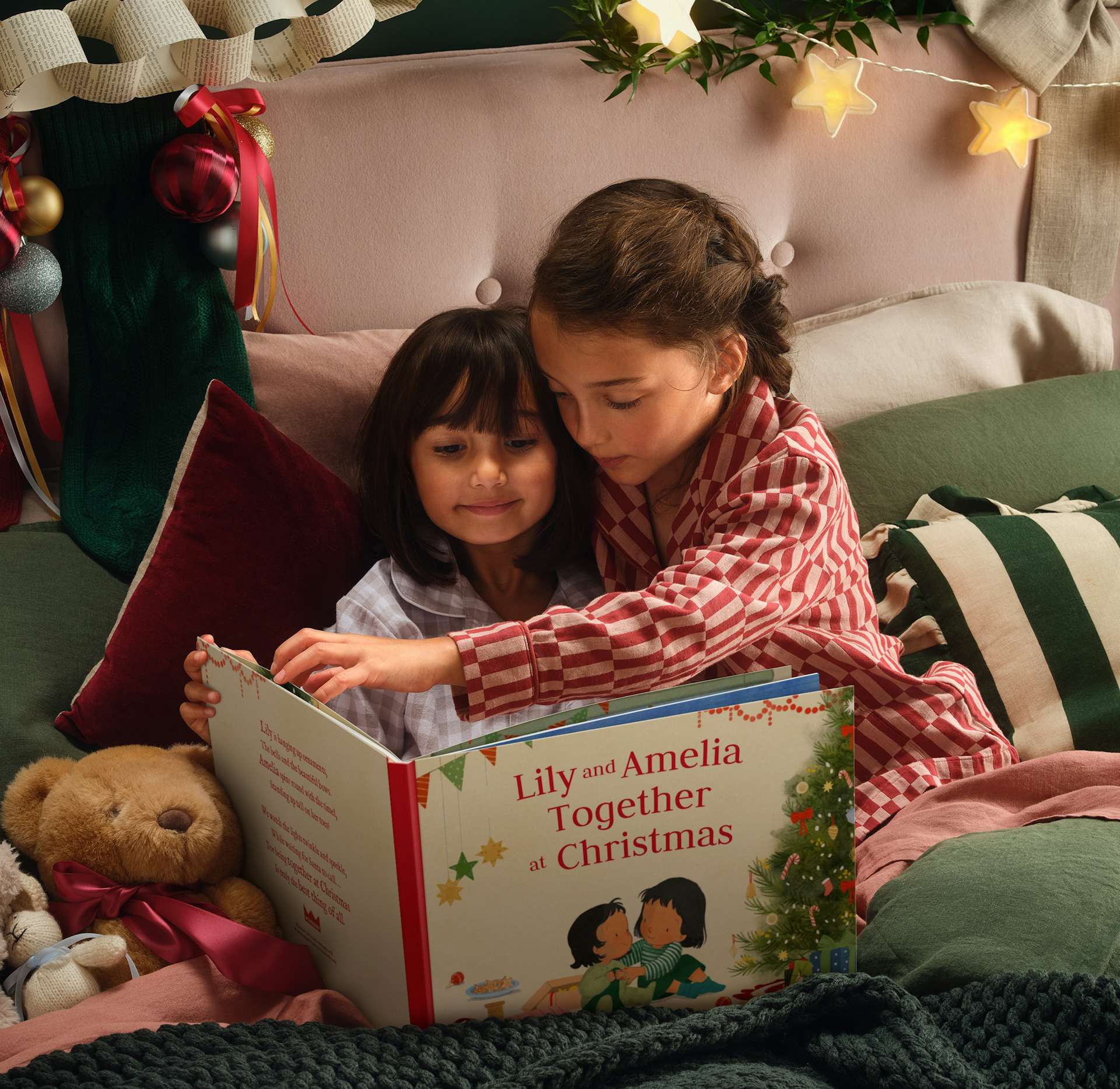 Children holding their personalised books
