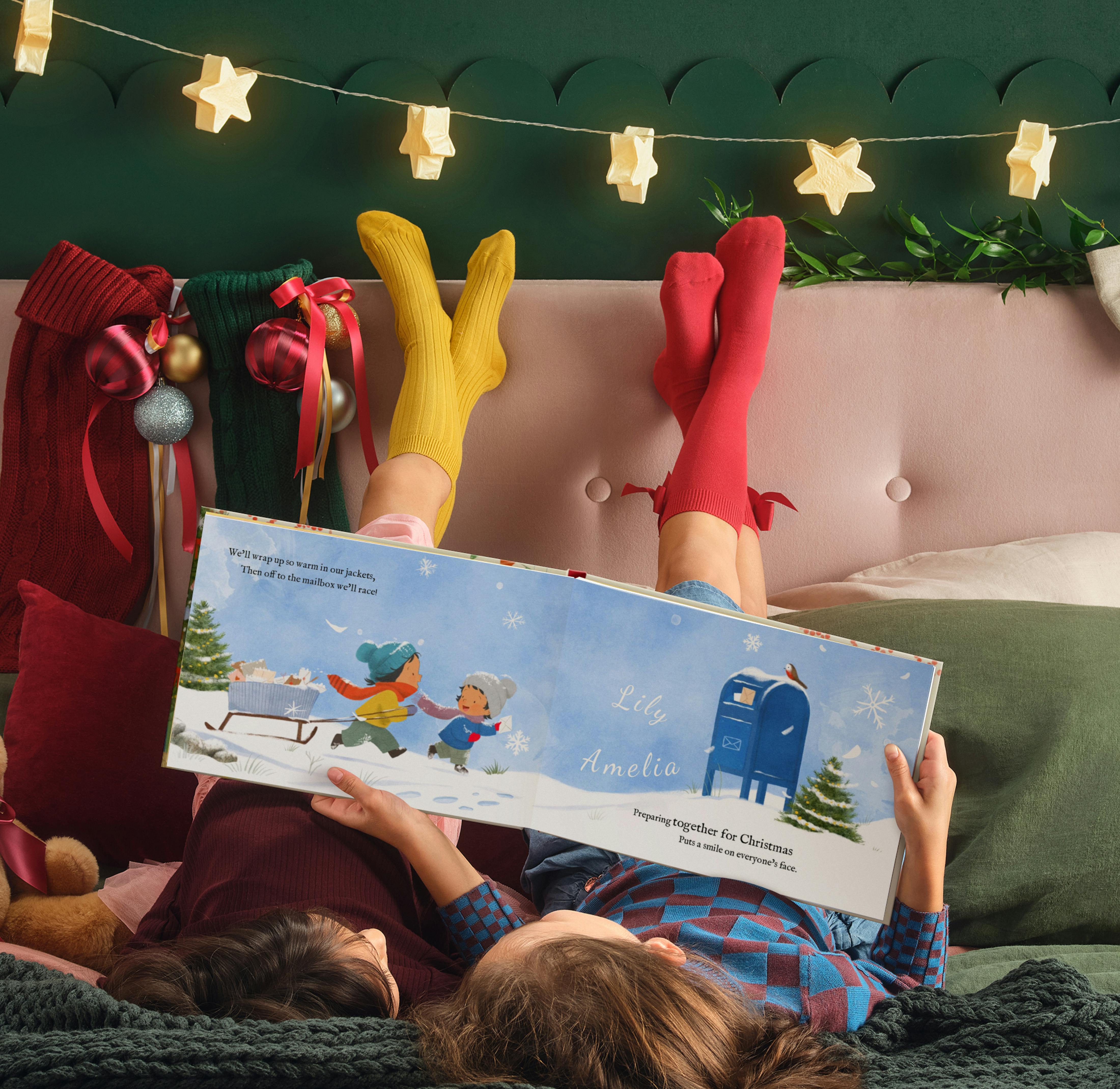Children holding their personalised book