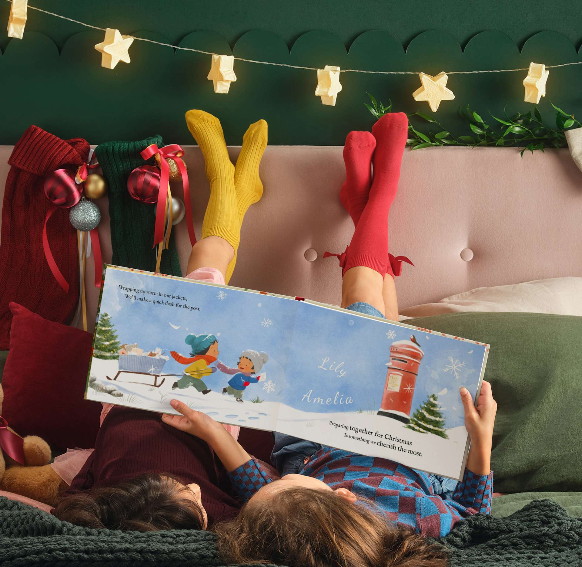 Children holding their personalised book