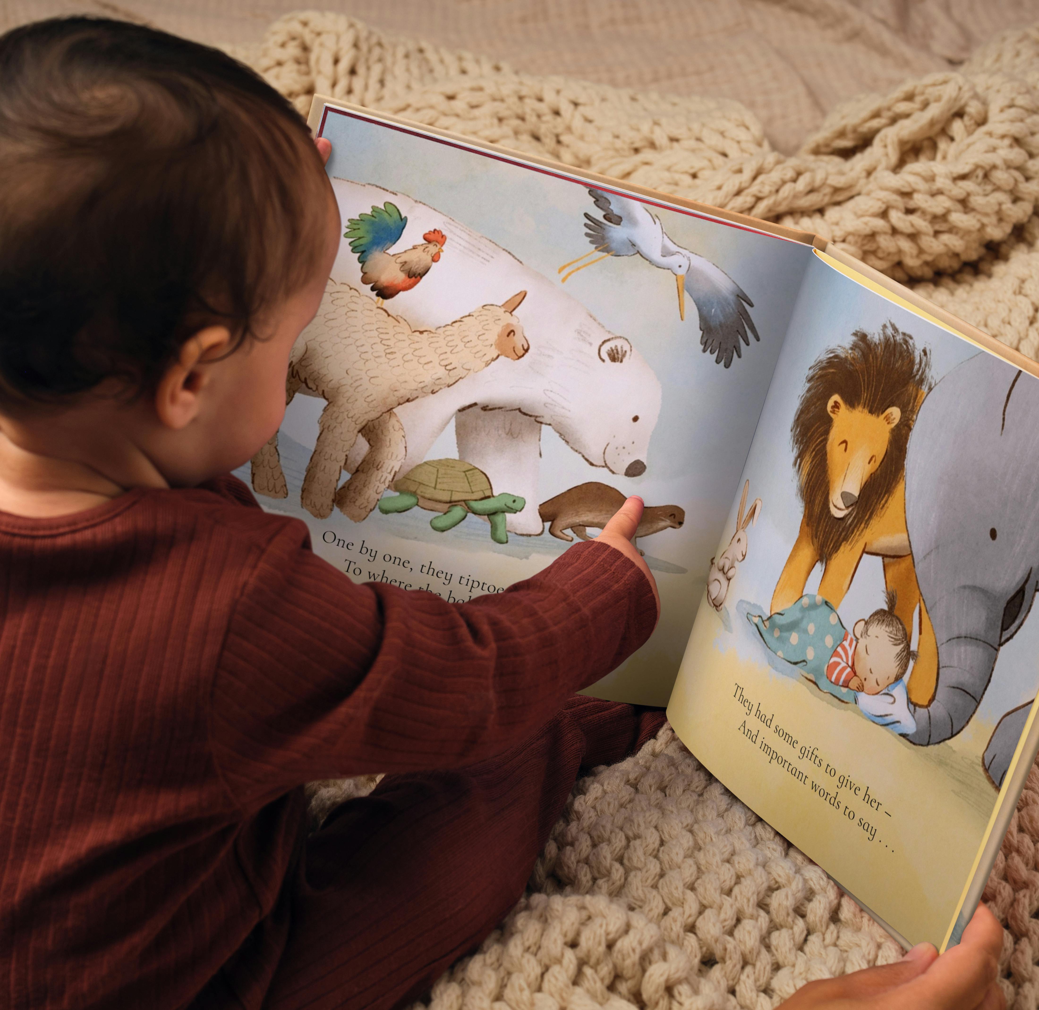 A child and mother reading the personalised book