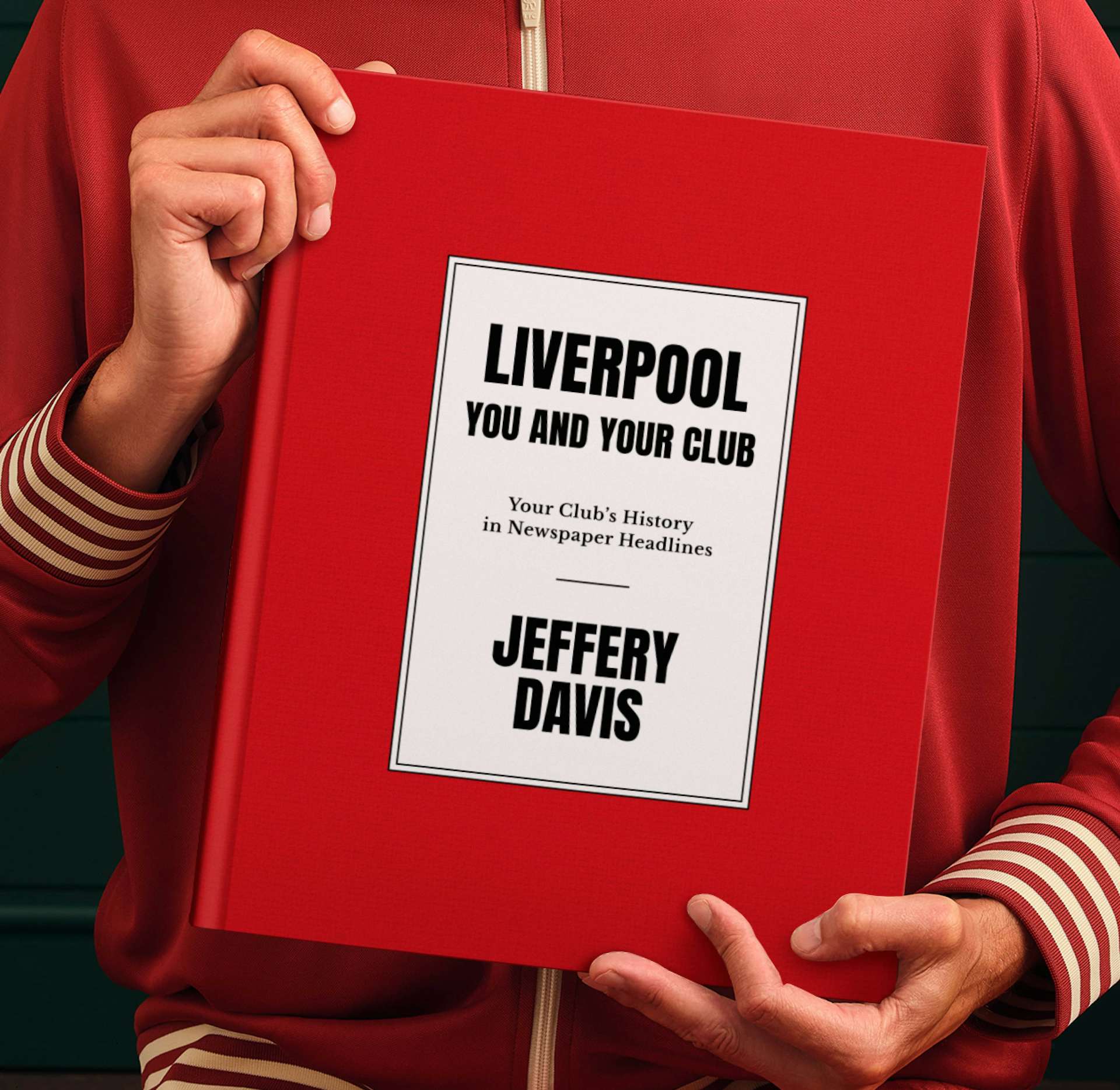 Two hands holding a personalised book cover